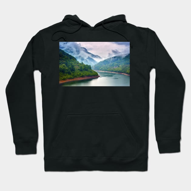 Lake in the mountains on a foggy day Hoodie by naturalis